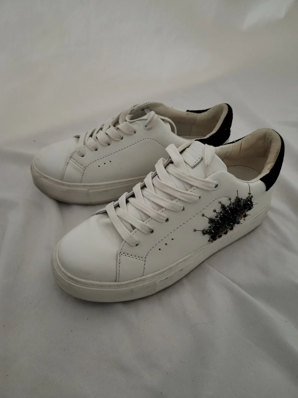 Kurt Geiger White Low-Top Sneakers with Black Heel and Embellishment